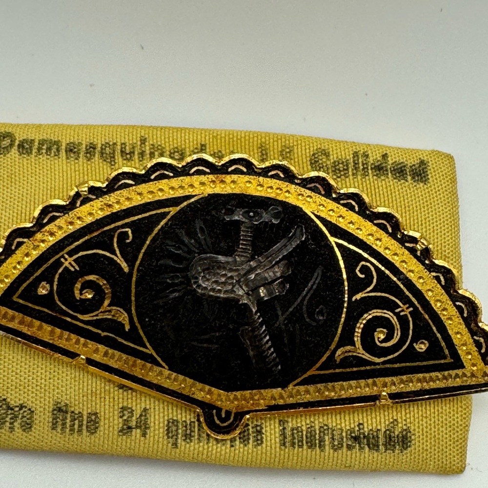 Artistic Black and Gold Brooch